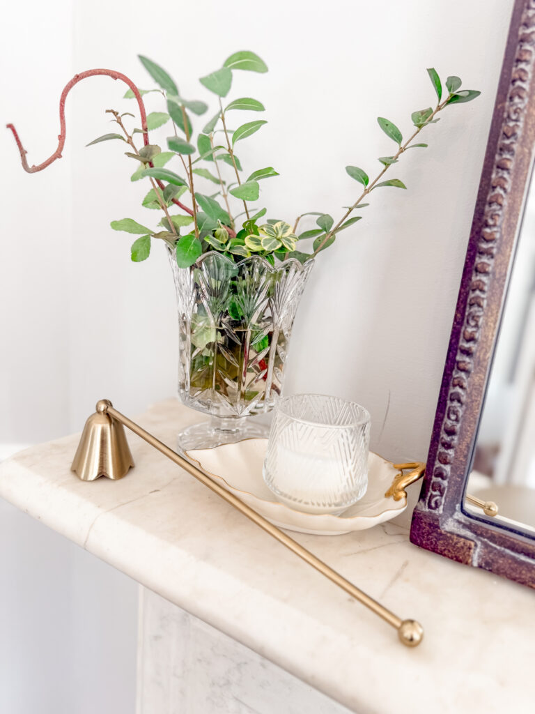 fall greenery with candle and candle snuffer