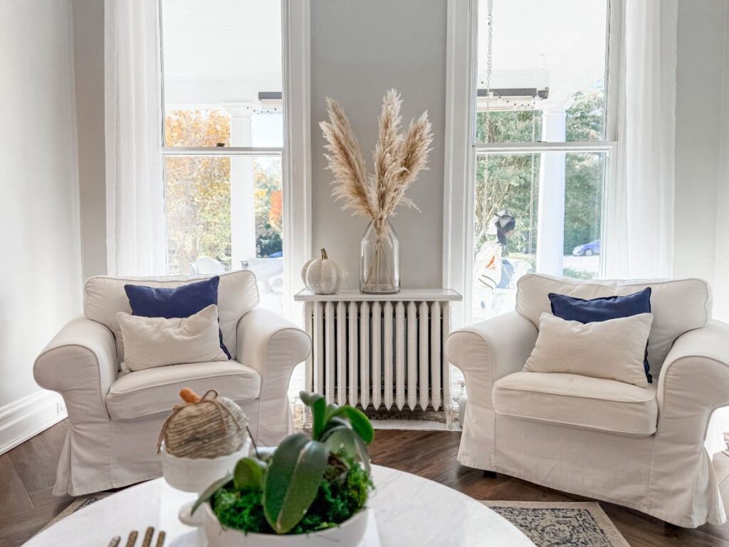 Muted pumpkins in white living room