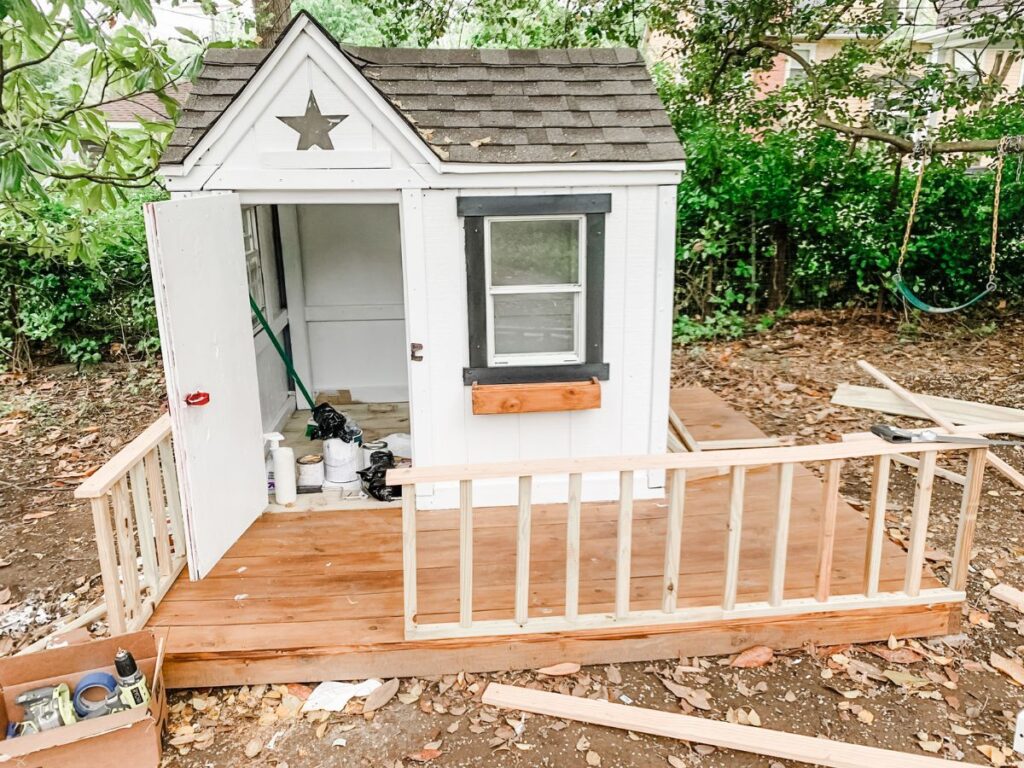 building a fence around the playhouse