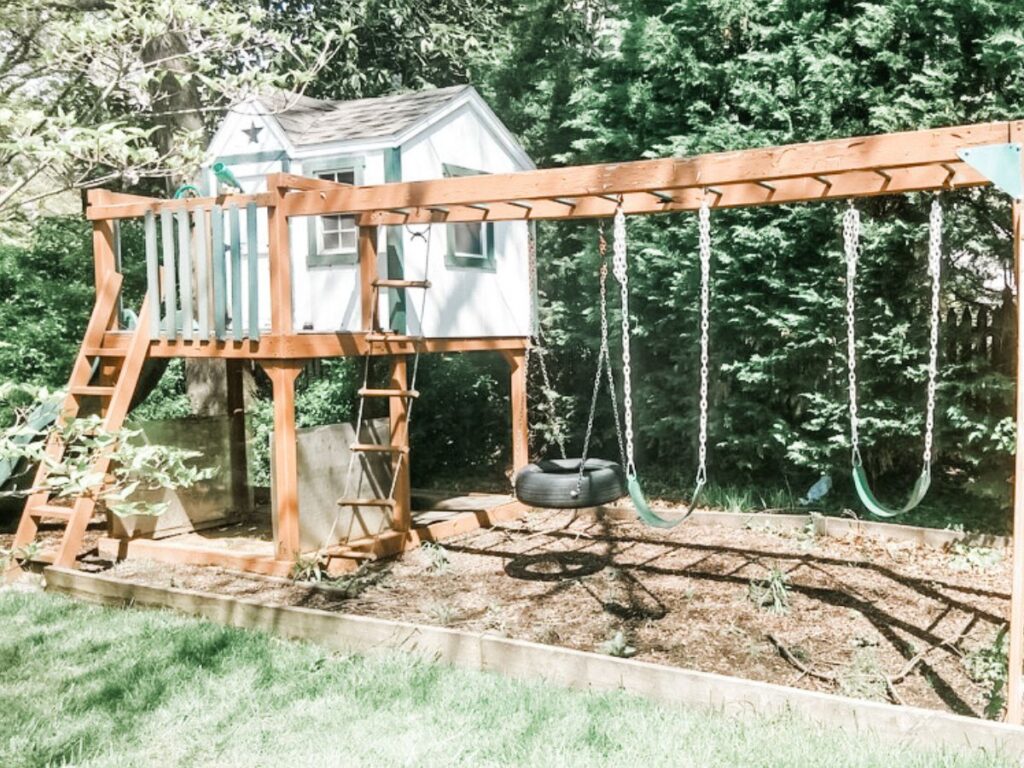 The original swingset and playhouse