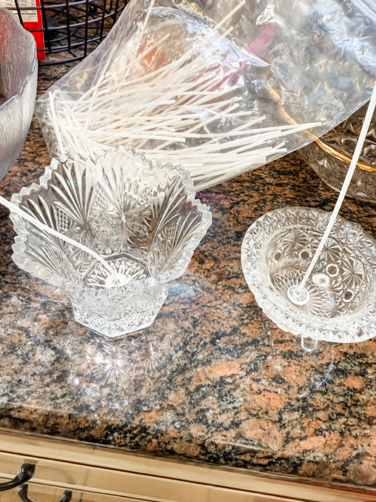 Candle wicks attached to crystal bowls